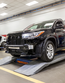Toyota on vehicle lift | Bommarito Toyota in Hazelwood MO